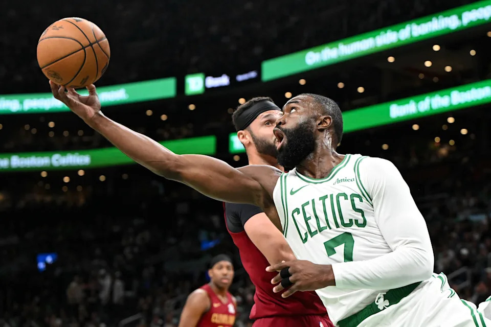 Oct 12, 2025; Boston, Massachusetts, USA; Boston Celtics guard/forward Jaylen Brown (7) attempts a layup against the Cleveland Cavaliers during the first half at TD Garden. Brian Fluharty-Imagn Images