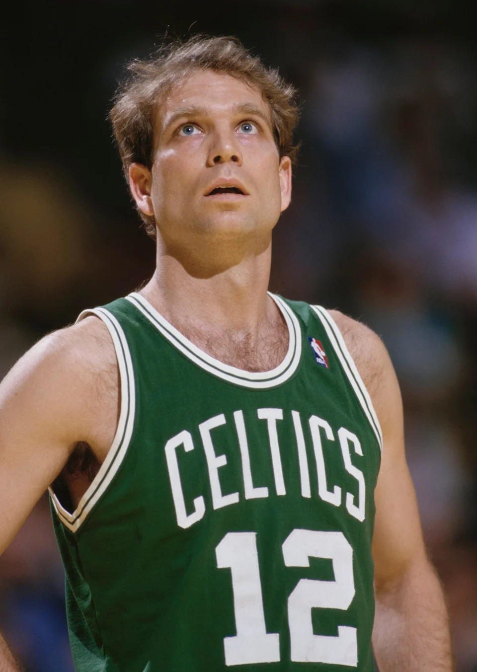 Jerry Sichting #12, Point Guard for the Boston Celtics looks on during the NBA Pacific Division basketball game against the Los Angeles Lakers on 16th February 1986 at The Forum arena in Inglewood, Los Angeles, California, United States. The Boston Celtics won the game 105 - 99. (Photo by Rick Stewart/Allsport/Getty Images)