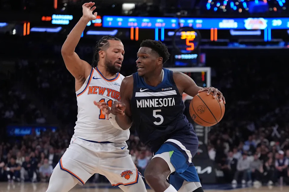 Minnesota Timberwolves' Anthony Edwards (5) drives past New York Knicks' Jalen Brunson (11) during the first half of a preseason NBA basketball game Thursday, Oct. 9, 2025, in New York. (AP Photo/Frank Franklin II)