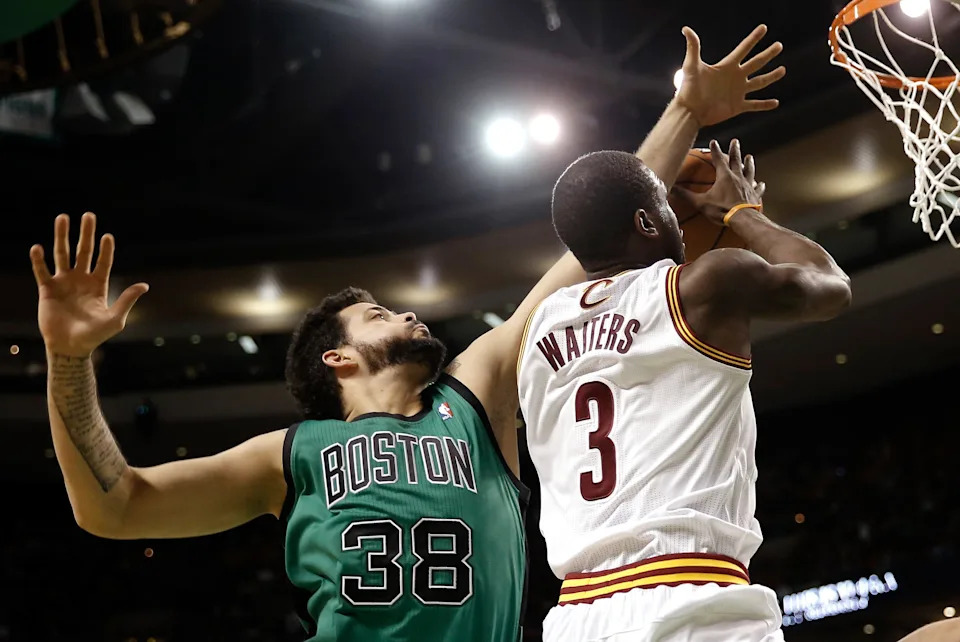 Nov 29, 2013; Boston, MA, USA; Cleveland Cavaliers shooting guard Dion Waiters (3) has his layup attempt blocked by Boston Celtics center Vitor Faverani (38) during the second half of Boston's 103-86 win at TD Garden. Mandatory Credit: Winslow Townson-USA TODAY Sports