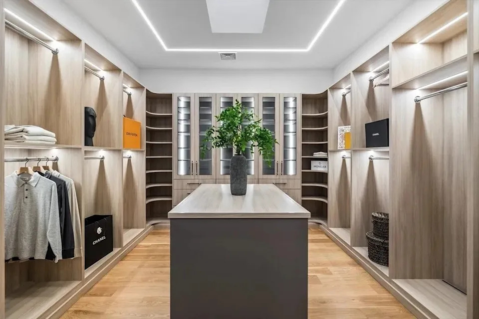 Walk in closet in a luxury home in Massachusetts that belongs to Jrue Holiday