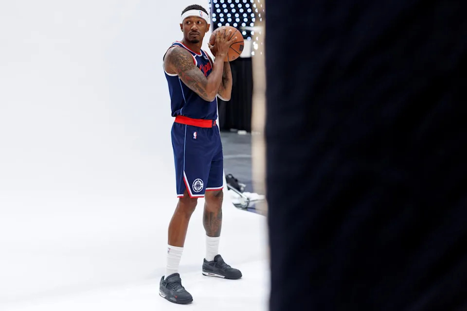 Clippers guard Bradley Beal poses for a photo with a basketballduring the team's media day.