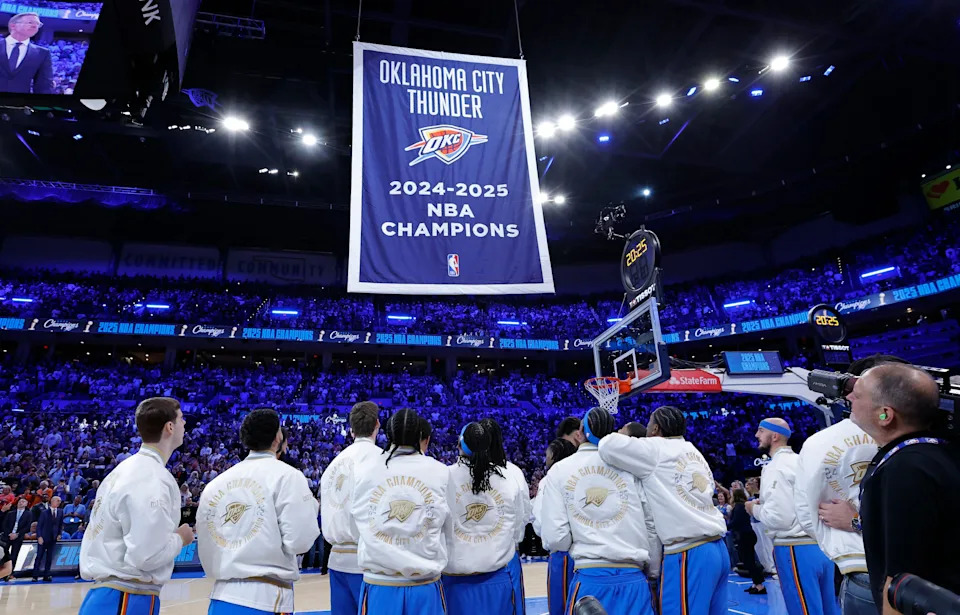 Oct 21, 2025; Oklahoma City, Oklahoma, USA; Oklahoma City Thunder watch as their championship banner rises during the championship ring and banner ceremony before the start of their game against the Houston Rockets at Paycom Center. Mandatory Credit: Alonzo Adams-Imagn Images