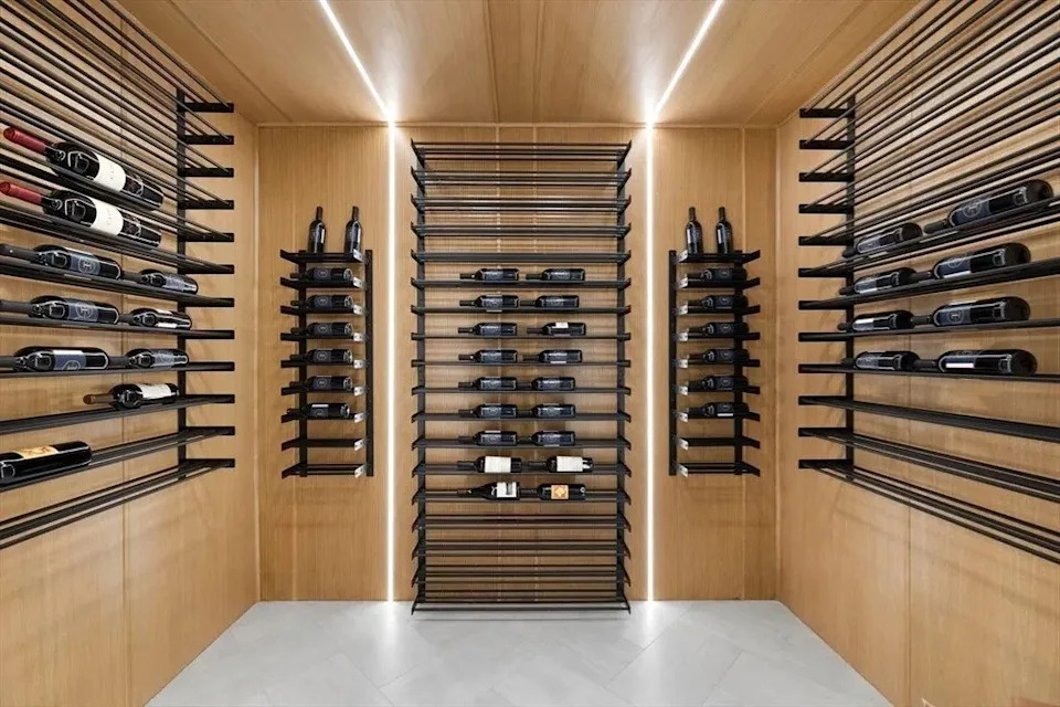 Wine room in a luxury home in Massachusetts that belongs to Jrue Holiday