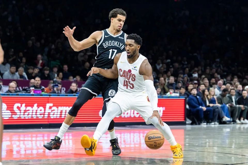 Cleveland Cavaliers guard Donovan Mitchell (45) drives around Brooklyn Nets forward Michael Porter Jr. (17) in the first half. Corey Sipkin for the NY POST