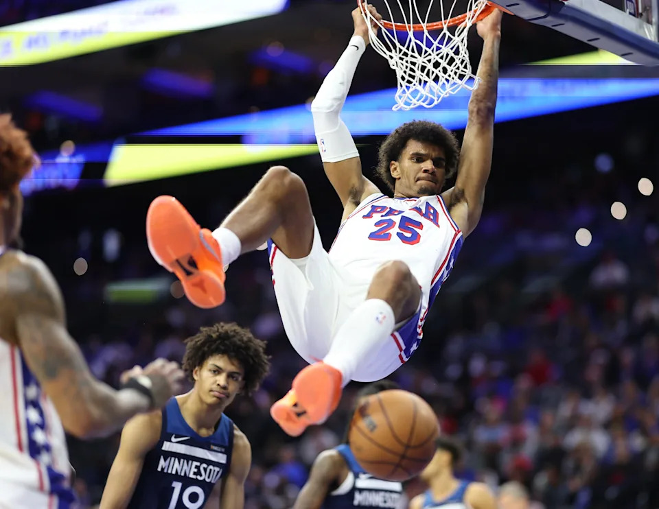 Oct 17, 2025; Philadelphia, Pennsylvania, USA; Philadelphia 76ers forward Dominick Barlow (25) dunks the ball against the Minnesota Timberwolves during the third quarter at Xfinity Mobile Arena. Mandatory Credit: Bill Streicher-Imagn Images