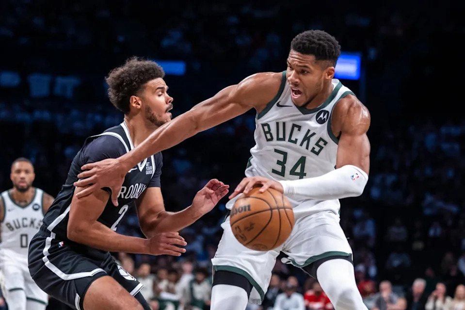 Brooklyn Nets forward Cameron Johnson (2) defends Milwaukee Bucks forward Giannis Antetokounmpo (34) in the first half at Barclays Center, Sunday, Oct. 27, 2024, in Brooklyn, NY. Corey Sipkin for the NY POST