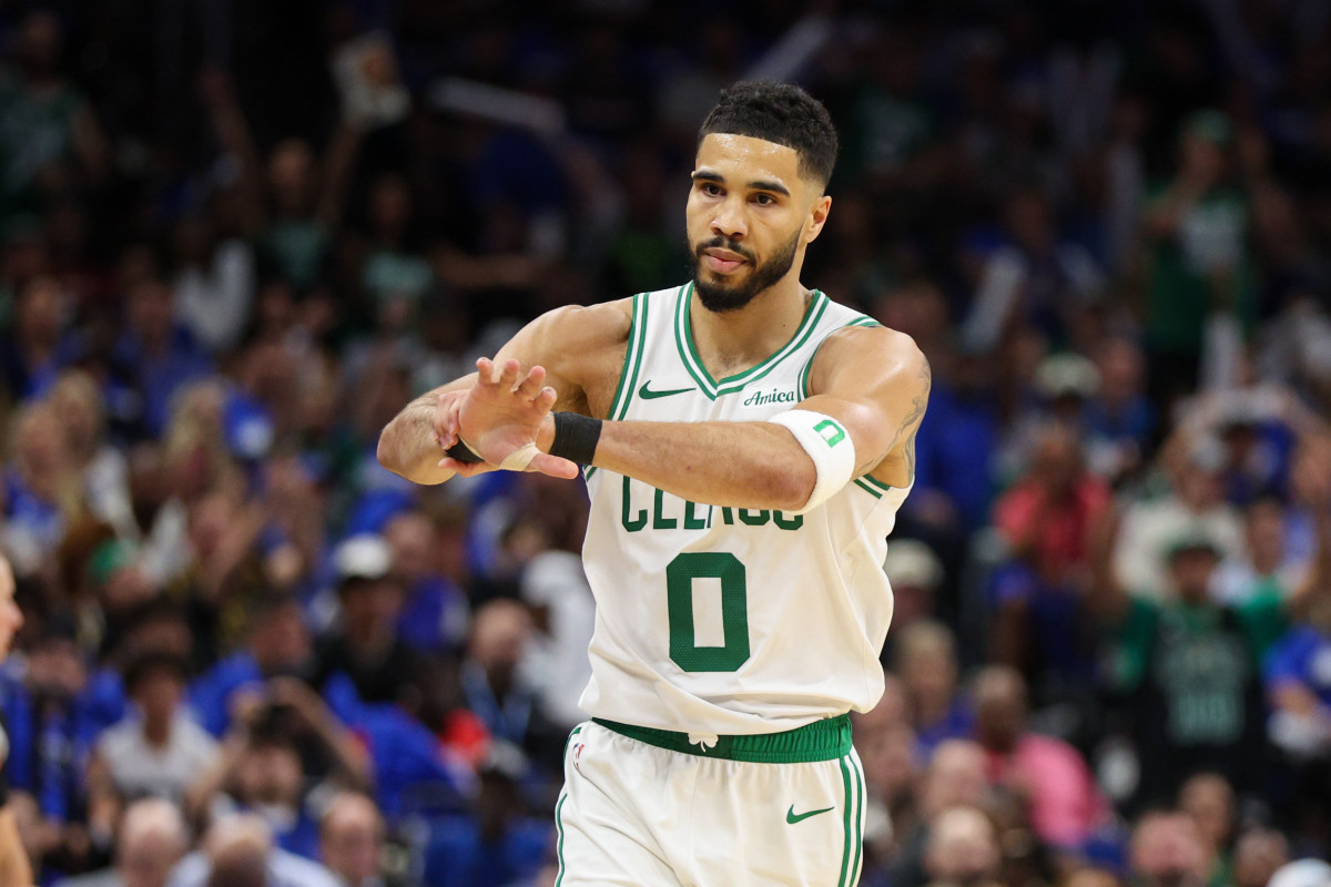Apr 27, 2025; Orlando, Florida, USA; Boston Celtics forward Jayson Tatum (0) reacts after making a there point shot against the Orlando Magic in the second quarter during game four of first round for the 2025 NBA Playoffs at Kia Center. Mandatory Credit: Nathan Ray Seebeck-Imagn Images