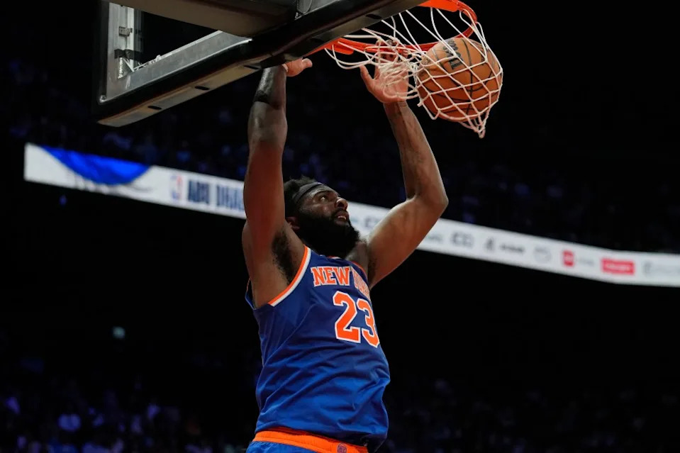 Mitchell Robinson slams home a dunk during the Knicks’ preseason win over the 76ers. AP