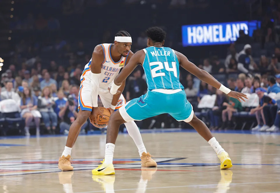 Oct 9, 2025; Oklahoma City, Oklahoma, USA; Oklahoma City Thunder guard Shai Gilgeous-Alexander (2) is defended by Charlotte Hornets forward Brandon Miller (24) during the 1st quarter of a game between the Charlotte Hornets and the Oklahoma City Thunder at Paycom Center. Mandatory Credit: Alonzo Adams-Imagn Images