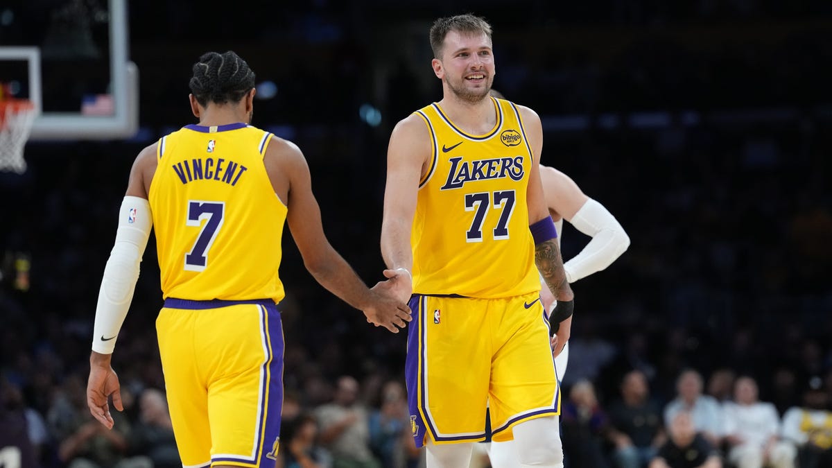 Luka Dončić scores 49 points to lead Lakers to first win of season