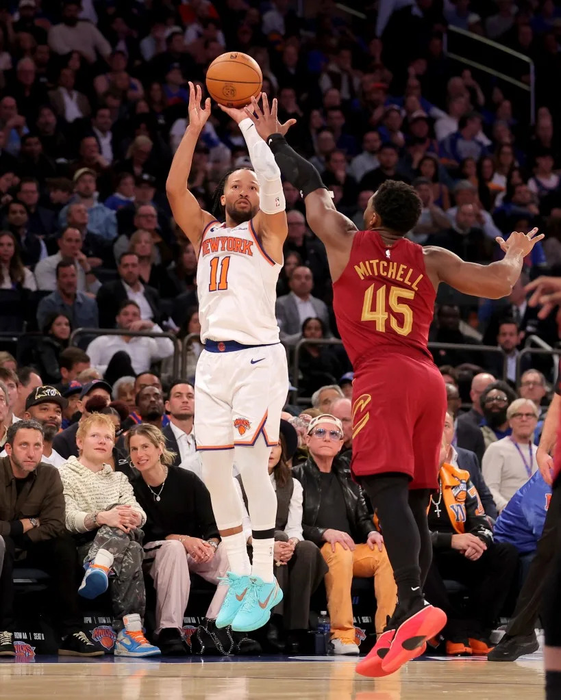Jalen Brunson shoots a jumper over Donovan Mitchell during the fourth quarter of the Knicks’ opening-night win over the Cavaliers at Madison Square Garden. IMAGN IMAGES via Reuters Connect