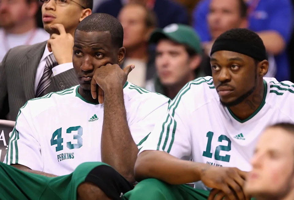 PHOENIX - DECEMBER 30: Kendrick Perkins #43 and Bill Walker #12 of the Boston Celtics react on the bench during the NBA game against the Phoenix Suns at US Airways Center on December 30, 2009 in Phoenix, Arizona. The Suns defeated the Celtics 116-98. NOTE TO USER: User expressly acknowledges and agrees that, by downloading and or using this photograph, User is consenting to the terms and conditions of the Getty Images License Agreement. (Photo by Christian Petersen/Getty Images)