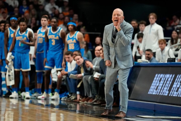 UCLA coach Mick Cronin yells towards his players during the first half in the second round of the NCAA college basketball tournament against Tennessee, Saturday, March 22, 2025, in Lexington, Ky. (AP Photo/Brynn Anderson)