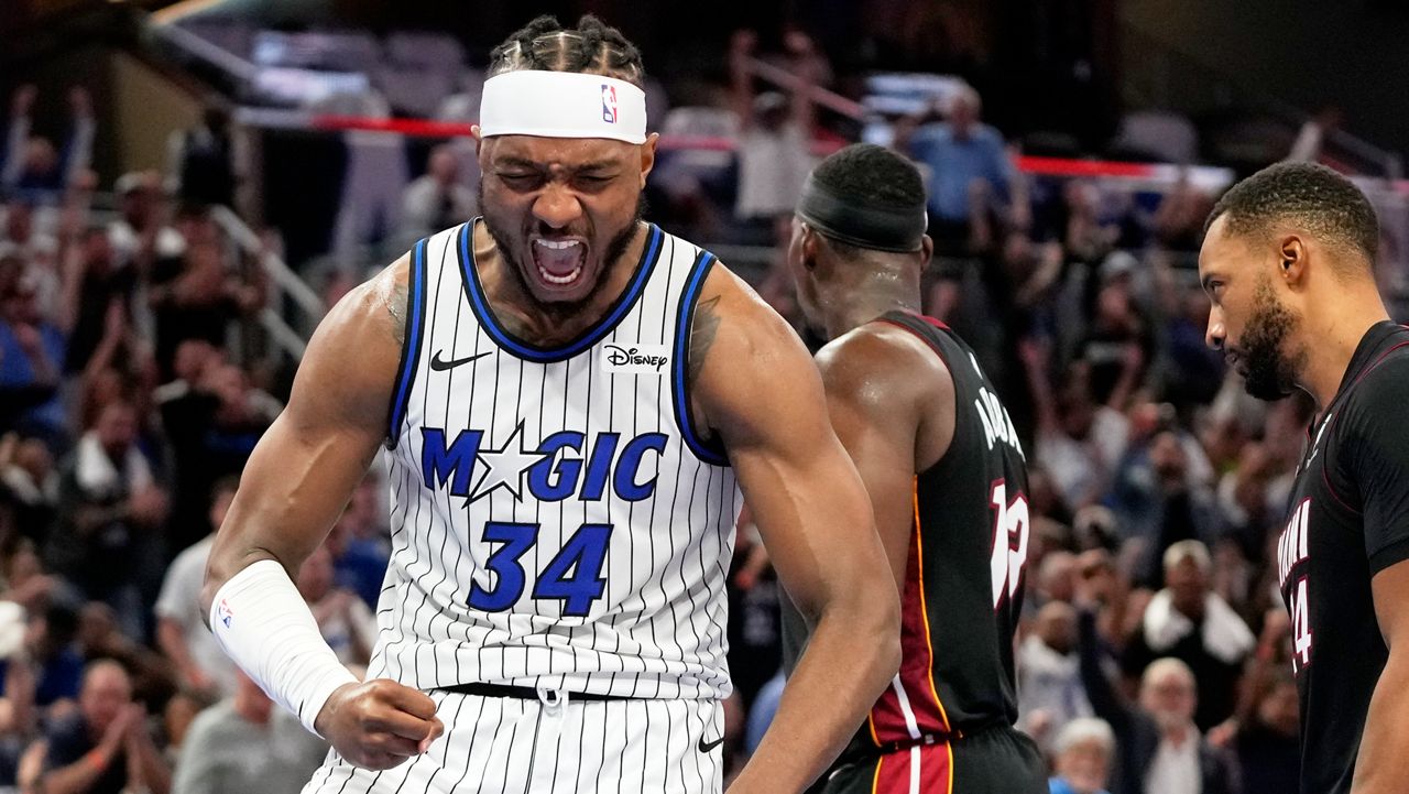 Orlando Magic center Wendell Carter Jr. (34) reacts after making a big play against the Miami Heat during the second half of an NBA basketball game, Wednesday, Oct. 22, 2025, in Orlando, Fla. (AP Photo/John Raoux)
