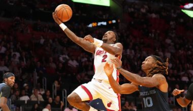 Miami Heat guard Terry Rozier (2) drives to the basket as Memphis Grizzlies guard Javon Small (10) defends during the second half of an NBA preseason basketball game Friday, Oct. 17, 2025, in Miami.
