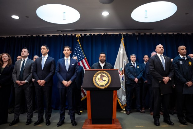 FBI director Kash Patel speaks at a press conference announcing the arrests of Portland Trail Blazers head coach Chauncey Billups and Miami Heat guard Terry Rozier in connection with a federal investigation into sports betting and illegal gambling, Thursday, Oct. 23, 2025, in New York. (AP Photo/Angelina Katsanis)