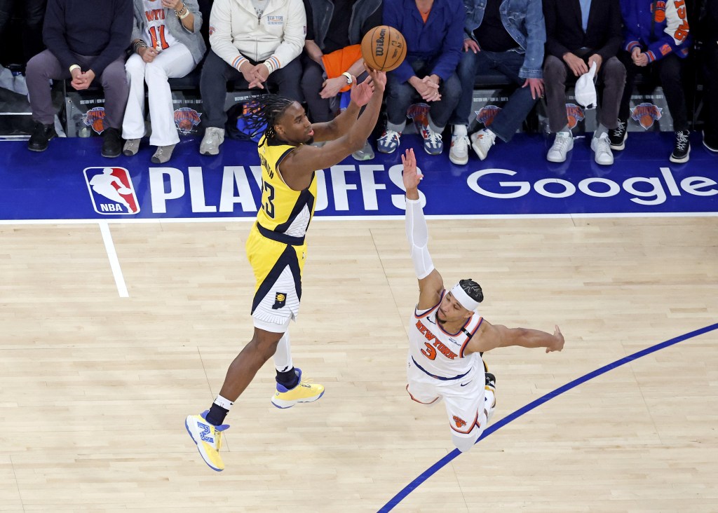 Aaron Nesmith, who had a big fourth quarter, shoots a 3-pointer over Josh Hart during the Knicks' Game 1 loss to the Pacers.