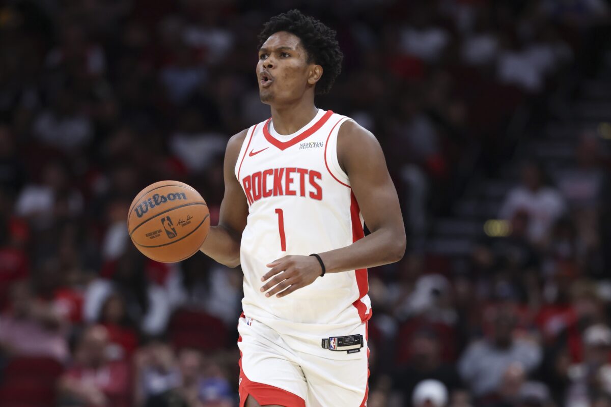 Houston Rockets guard Amen Thompson (1) dribbles the ball during the second quarter against the Atlanta Hawks at Toyota Center.