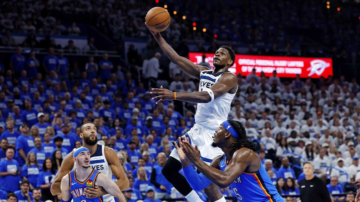 Minnesota Timberwolves guard Anthony Edwards (5) shoots the ball againts Oklahoma City Thunder forward Jaylin Williams (6) during the second quarter in game five of the western conference finals for the 2025 NBA Playoffs at Paycom Center. 