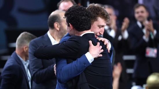 Danny Wolf (R) celebrates with family after being drafted twenty-seventh overall by the Brooklyn Nets during the first round of the 2025 NBA Draft at Barclays Center on June 25, 2025 in the Brooklyn borough of New York City. (Getty Images via AFP)