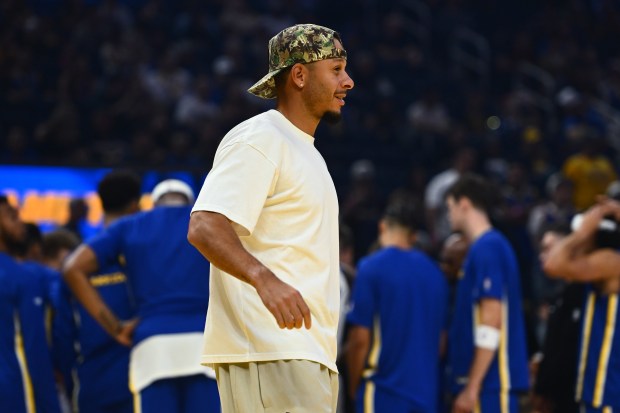Golden State Warriors' Seth Curry (31) walks on the court before their preseason NBA game at Chase Center in San Francisco, Calif., on Sunday, Oct. 5, 2025. (Jose Carlos Fajardo/Bay Area News Group)