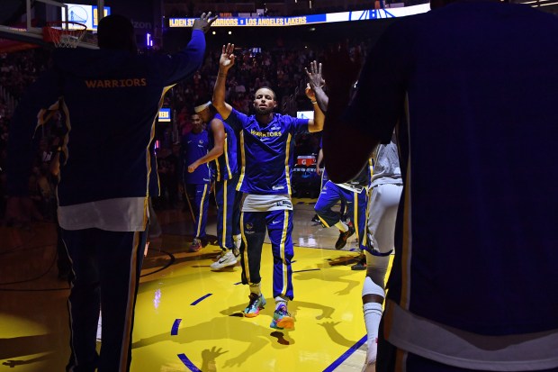 Golden State Warriors' Stephen Curry (30) is introduced before the start of their preseason NBA game at Chase Center in San Francisco, Calif., on Sunday, Oct. 5, 2025. (Jose Carlos Fajardo/Bay Area News Group)