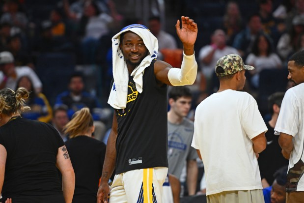 Golden State Warriors' Jonathan Kuminga (1) waves to someone in the crowd in the third quarter of their preseason NBA game at Chase Center in San Francisco, Calif., on Sunday, Oct. 5, 2025. (Jose Carlos Fajardo/Bay Area News Group)