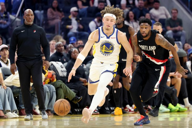 Golden State Warriors' Brandin Podziemski (2) drives past Portland Trail Blazers' Blake Wesley (1) in the second quarter of an NBA preseason game at Chase Center in San Francisco, Calif., on Wednesday, Oct. 8, 2025. (Ray Chavez/Bay Area News Group)