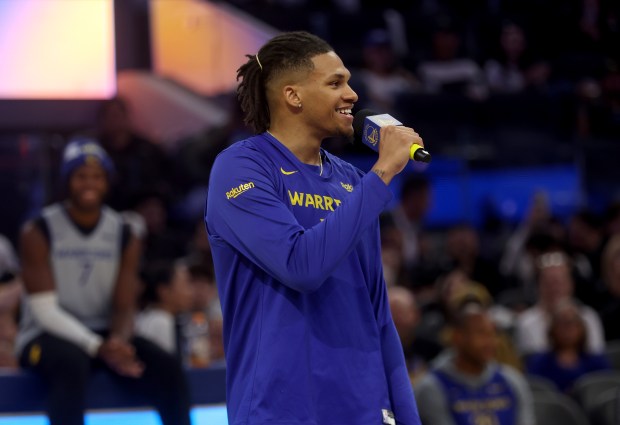 Golden State Warriors rookie Will Richard #3 sings a song...