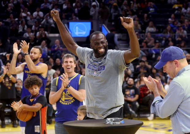 Golden State Warriors' Draymond Green #23 reacts after accepting the NBA's Hustle Award during their open practice at the Chase Center in San Francisco, Calif., on Thursday, Oct. 9, 2025. (Jane Tyska/Bay Area News Group)