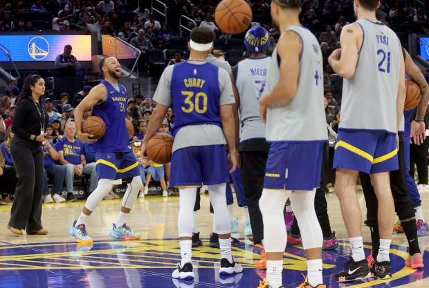 Golden State Warriors' Stephen Curry #31 reacts during their open...