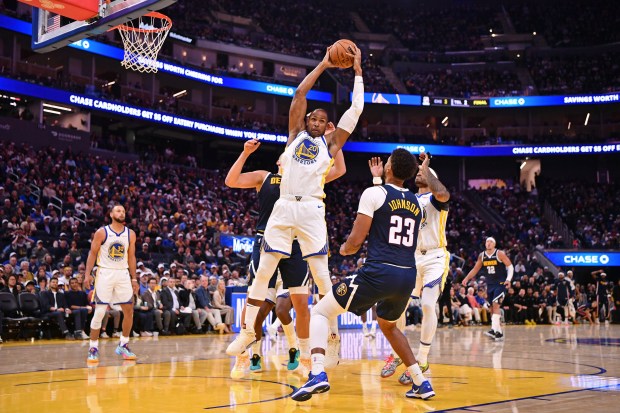 Golden State Warriors' Al Horford (20) grabs a rebound in the third quarter of their NBA game at Chase Center in San Francisco, Calif., on Thursday, Oct. 23, 2025. (Jose Carlos Fajardo/Bay Area News Group)