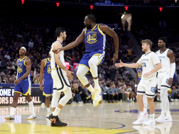 Golden State Warriors' Draymond Green #23 celebrates after Memphis Grizzlies' Santi Aldama #7 misses a second free throw in the third quarter of their NBA game at the Chase Center in San Francisco, Calif., on Monday, Oct. 27, 2025. A technical foul was called on Green, which was upgraded to a flagrant one foul. (Jane Tyska/Bay Area News Group)