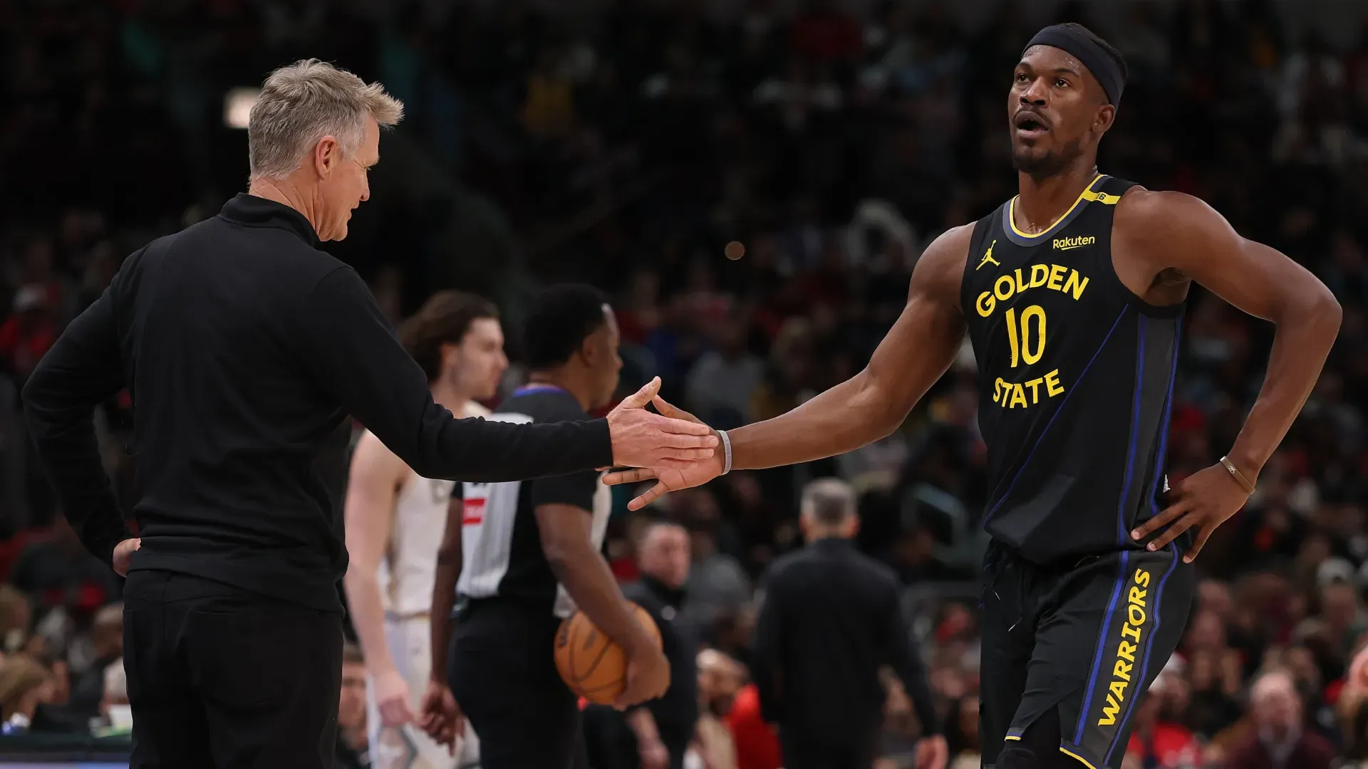 Head coach Steve Kerr and Jimmy Butler of the Golden State Warriors.