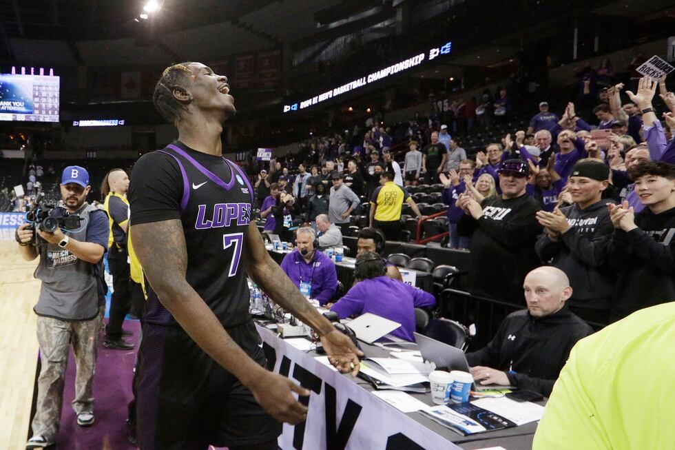 Grand Canyon guard Tyon Grant-Foster (7) celebrates with fans after the team's win against...