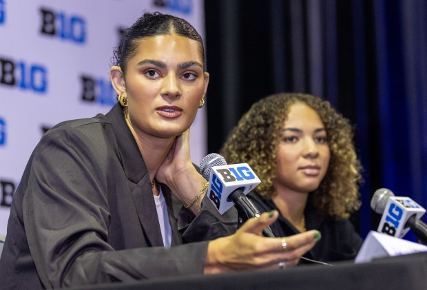 UCLA center Lauren Betts, left, answers questions from media while guard Kiki Rice looks on during Big Ten women's basketball media day Wednesday, Oct. 8. 2025, at the Donald E. Stephens Convention Center in Rosemont. (Dominic Di Palermo/Chicago Tribune)