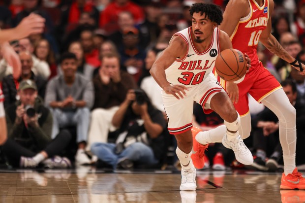 Chicago Bulls guard Tre Jones (30) brings the ball down court in the first quarter during a game against the Atlanta Hawks, Monday, Oct. 27, 2025, at the United Center in Chicago. (Dominic Di Palermo/Chicago Tribune)