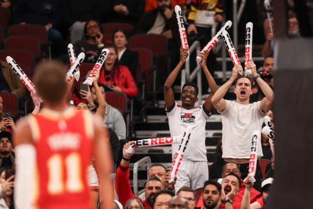 Fans make noise while Atlanta Hawks guard Trae Young (11) attempts a free throw in the first half during a game against the Chicago Bulls, Monday, Oct. 27, 2025, at the United Center in Chicago. (Dominic Di Palermo/Chicago Tribune)