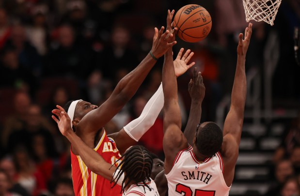 Atlanta Hawks' Onyeka Okongwu (17 and Chicago Bulls' Jalen Smith (25) ) go up for a rebound in the third quarter during a game, Monday, Oct. 27, 2025, at the United Center in Chicago. (Dominic Di Palermo/Chicago Tribune)