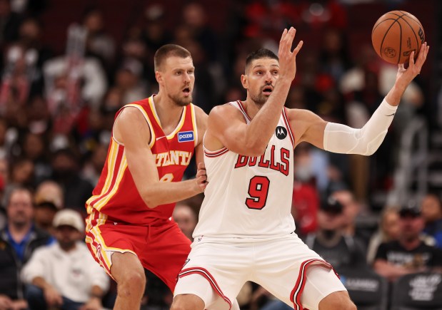 Chicago Bulls center Nikola Vučević (9) gets a hold of the ball in the fourth quarter during a game against the Atlanta Hawks, Monday, Oct. 27, 2025, at the United Center in Chicago. (Dominic Di Palermo/Chicago Tribune)