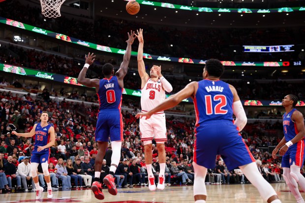 Chicago Bulls center Nikola Vucevic (9) goes up for a shot during the first quarter against the Detroit Pistons in the home opener at the United Center Wednesday Oct. 22, 2025 in Chicago. (Armando L. Sanchez/Chicago Tribune)