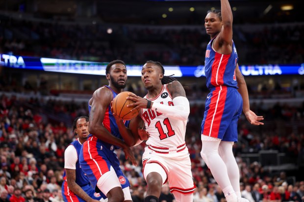 Chicago Bulls guard Ayo Dosunmu (11) drives to the basket during the first quarter of the home opener against the Detroit Pistons at the United Center Wednesday Oct. 22, 2025 in Chicago. (Armando L. Sanchez/Chicago Tribune)