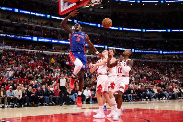 Detroit Pistons center Jalen Duren (0) dunks the ball during the third quarter of the home opener against the Chicago Bulls at the United Center Wednesday Oct. 22, 2025 in Chicago. (Armando L. Sanchez/Chicago Tribune)