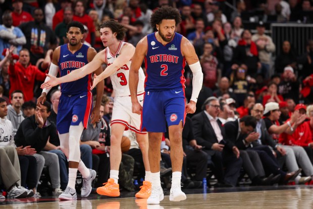 Detroit Pistons guard Cade Cunningham (2) yells after the ball went out of bounds while being handled by Chicago Bulls guard Josh Giddey (3) but after review the call was changed to Cunningham fouling Giddey during the fourth quarter of the home opener at the United Center Wednesday Oct. 22, 2025 in Chicago. (Armando L. Sanchez/Chicago Tribune)
