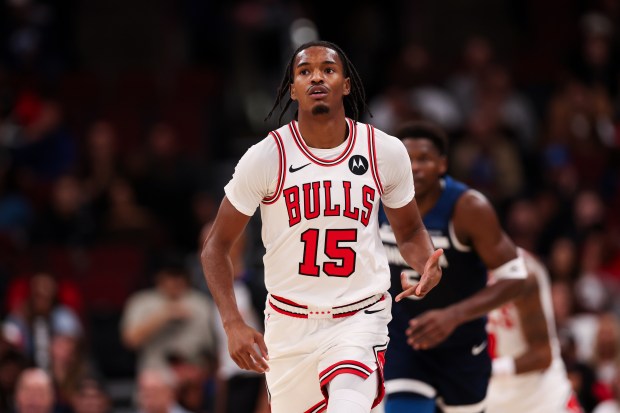 Chicago Bulls forward Julian Phillips (15) gestures after making a three-point basket during the first quarter against the Minnesota Timberwolves at the United Center Thursday Oct. 16, 2025, in Chicago. (Armando L. Sanchez/Chicago Tribune)