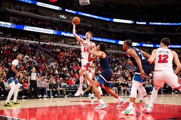 Chicago Bulls forward Matas Buzelis (14) goes up for basket during the fourth quarter against the Minnesota Timberwolves at the United Center Thursday Oct. 16, 2025, in Chicago. (Armando L. Sanchez/Chicago Tribune)