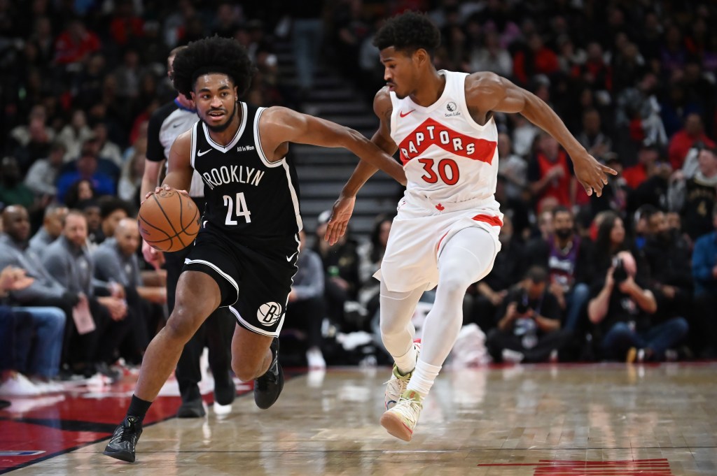 Cam Thomas, who was held to just seven points, drives past Ochai Agbaji during the Nets' loss to the Raptors in their preseason finale.