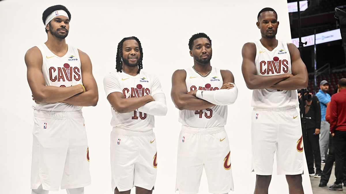 Cavaliers center Jarrett Allen (31) and guard Darius Garland (10) and guard Donovan Mitchell (45) and forward Evan Mobley (4) poses for a photo during media day at Rocket Arena