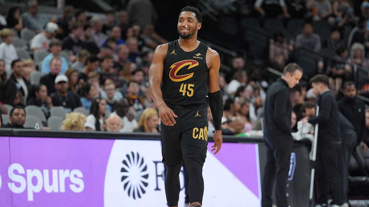 Cleveland Cavaliers guard Donovan Mitchell (45) looks over at the San Antonio Spurs bench in the second half at Frost Bank Center.